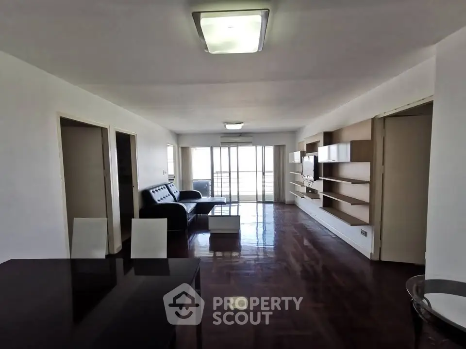 Spacious living room with modern furniture and open layout, perfect for entertaining.