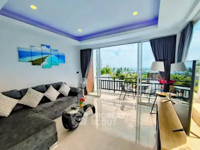 Stunning modern living room with ocean view and spacious balcony in luxury apartment.