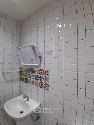 Modern bathroom with stylish tile design and sleek fixtures