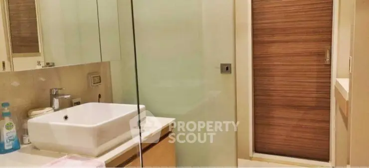 Modern bathroom with sleek design and glass shower enclosure