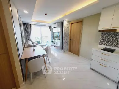 Modern open-plan living room with elegant dining area and stylish kitchen