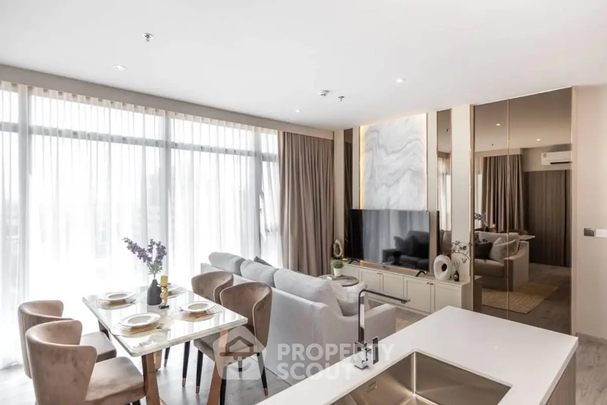 Luxurious open-plan living room with dining area and modern decor