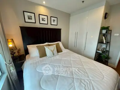 Cozy bedroom with modern decor and ample storage space