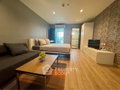 Modern studio apartment with stylish decor and cozy ambiance