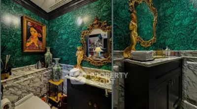 Luxurious bathroom with marble accents and ornate decor