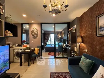 Chic modern apartment with open living space and cozy bedroom, featuring elegant decor and a washing machine.