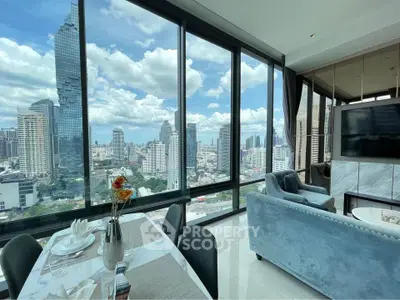 Luxurious high-rise apartment with stunning city skyline view and elegant interior design.