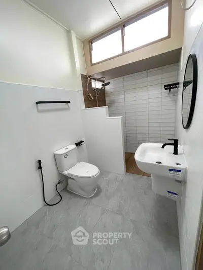 Modern bathroom with sleek fixtures and natural light