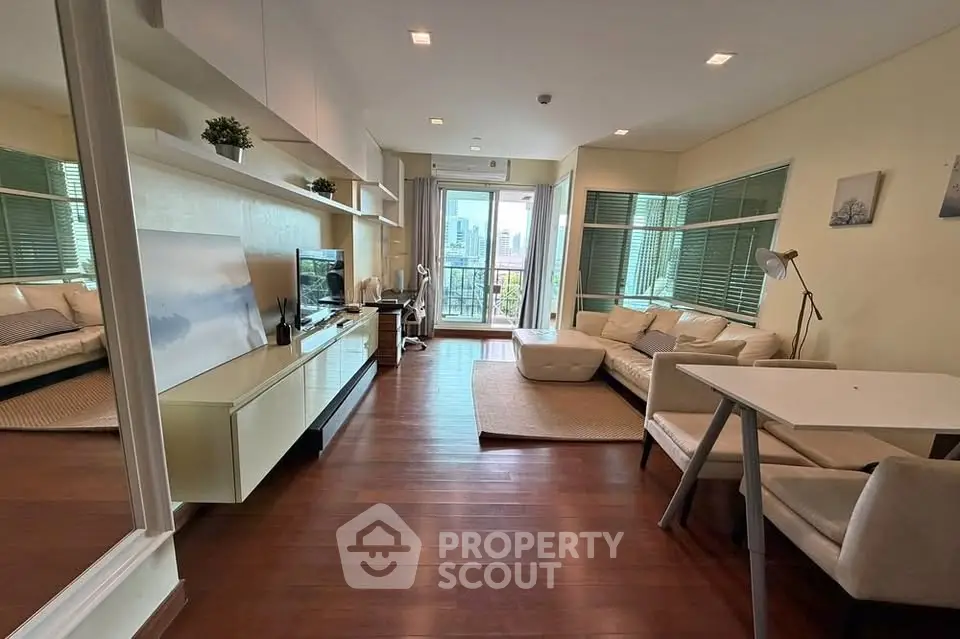 Spacious modern living room with city view and elegant decor