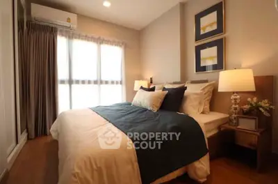 Cozy bedroom with elegant decor and natural light, perfect for relaxation.