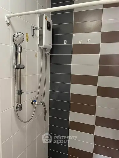 Modern bathroom with sleek shower and stylish tile design