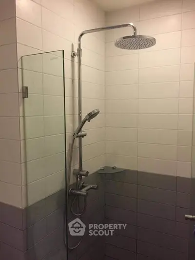 Modern bathroom shower with sleek design and glass partition