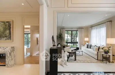 Luxurious living room with elegant decor and large windows offering natural light