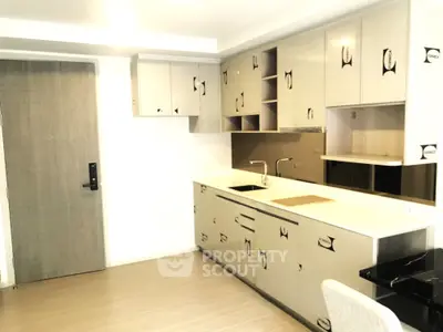 Modern kitchen with sleek cabinetry and minimalist design