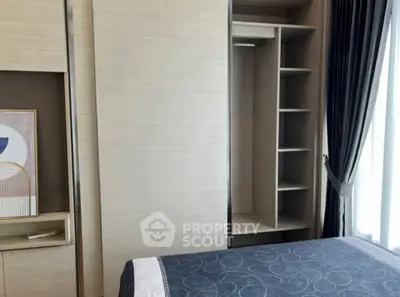 Modern bedroom with built-in wardrobe and stylish decor