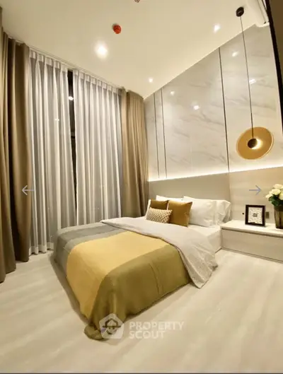 Luxurious modern bedroom with elegant decor and floor-to-ceiling windows