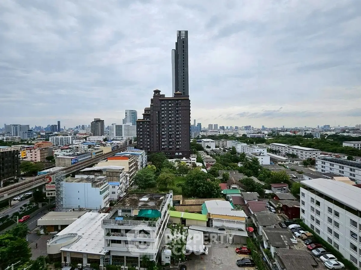 Stunning cityscape view with modern high-rise buildings and lush greenery.