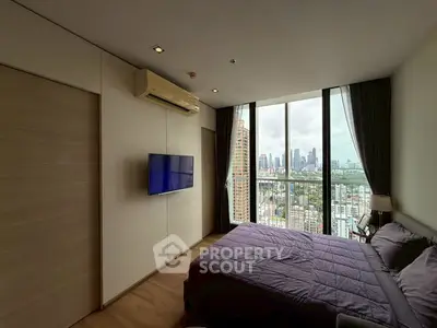 Modern bedroom with city view and sleek design