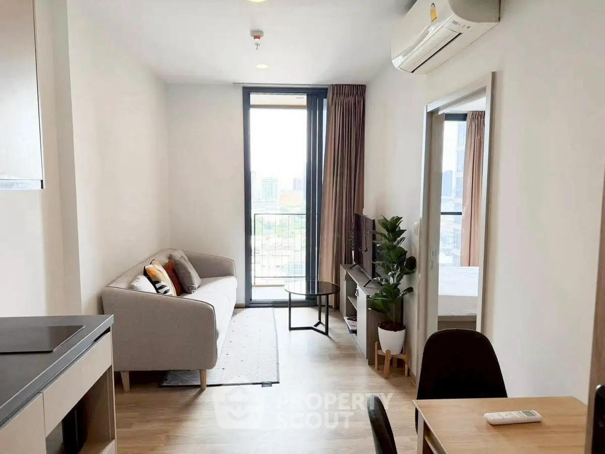 Modern living room with balcony view in a stylish apartment