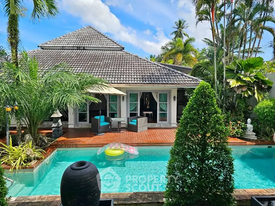 Luxurious tropical villa with private pool and lush garden, perfect for serene living.