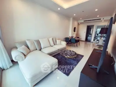 Spacious modern living room with elegant sofa and stylish decor