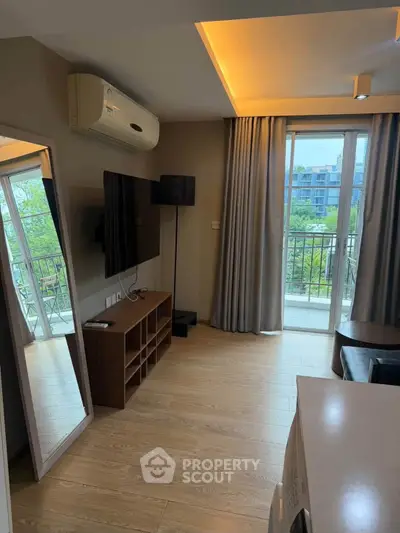 Modern living room with balcony view and stylish decor