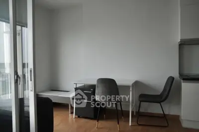 Modern minimalist study area with sleek furniture and natural light