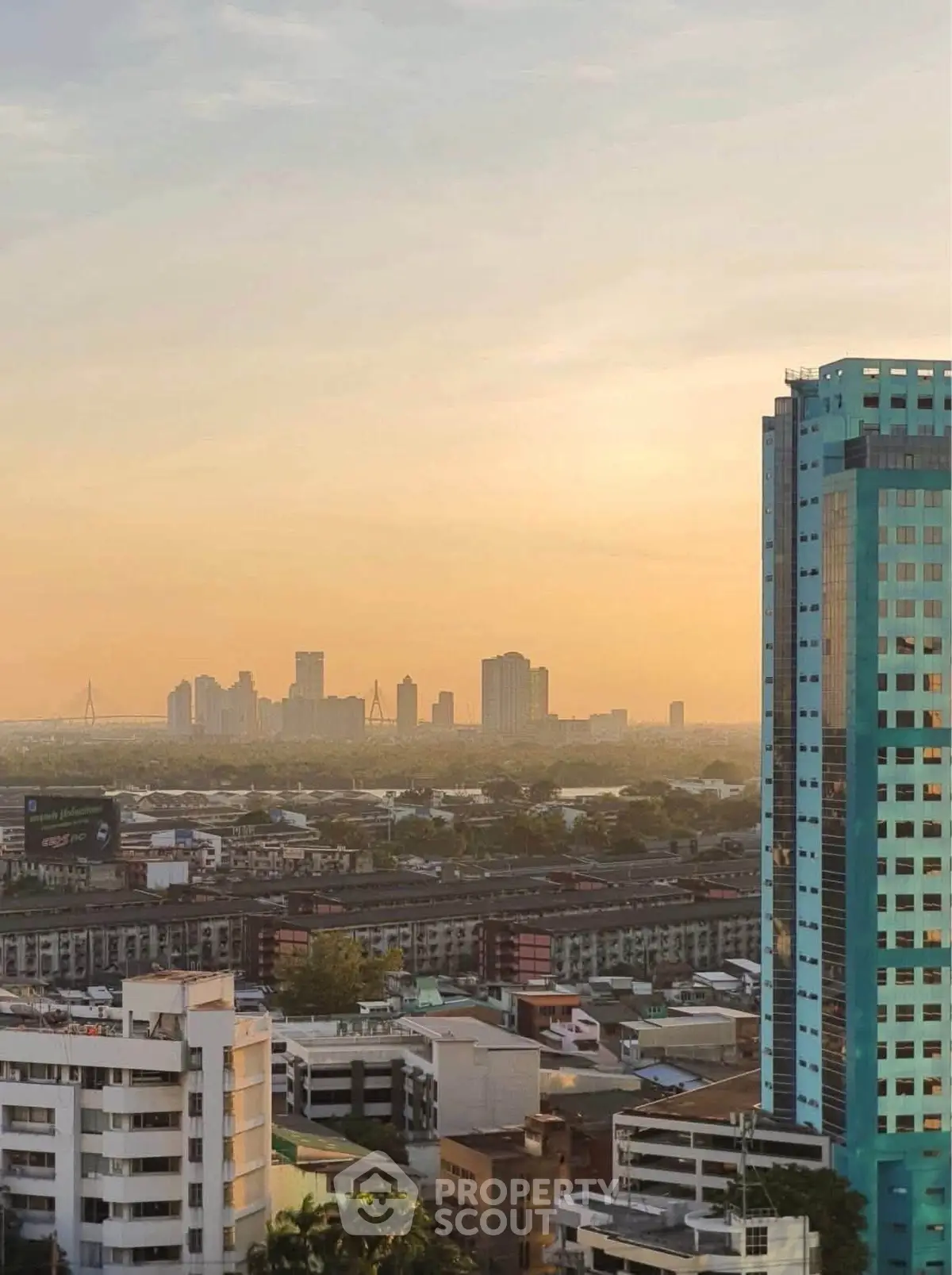 Stunning cityscape view with modern high-rise buildings at sunset, perfect for urban living enthusiasts.