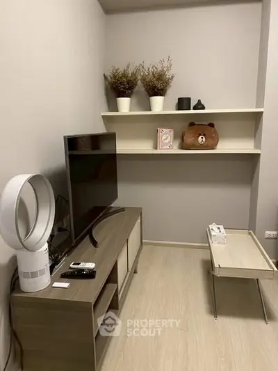 Cozy living room with modern decor and entertainment setup