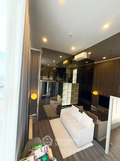 Luxurious modern living room with high ceilings and elegant decor