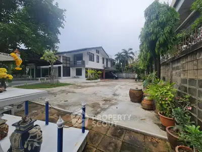 Spacious suburban home with lush garden and ample parking space