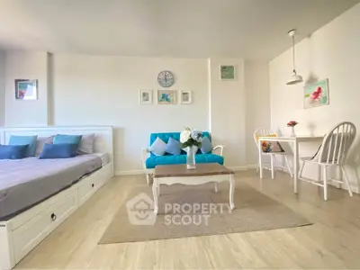 Charming studio apartment with cozy living area and stylish decor