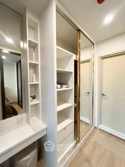 Modern bedroom with built-in closet and sleek design