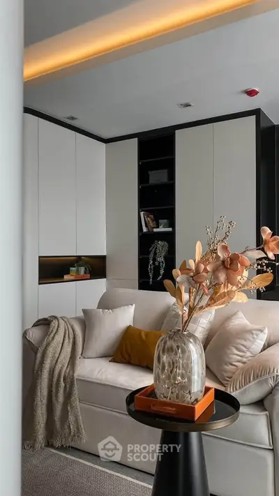 Modern living room with elegant decor and cozy seating area