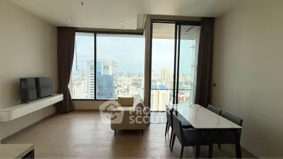 Modern living room with stunning city view and elegant furnishings