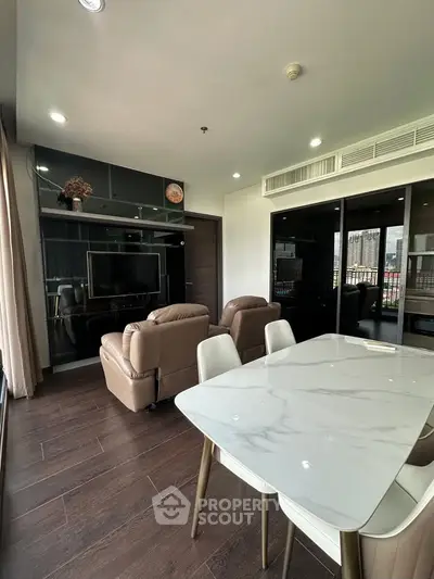 Modern living room with elegant dining area and stylish furniture