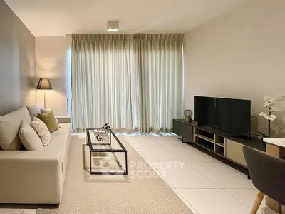 Modern living room with sleek furniture and natural light