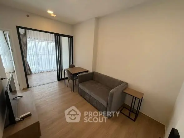 Modern living room with sleek furniture and natural light