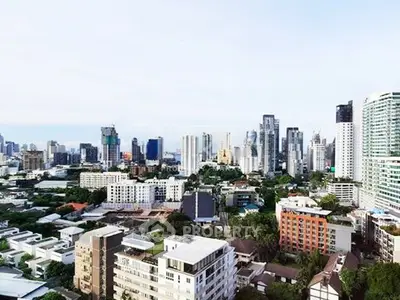 Stunning cityscape view showcasing modern skyline and lush greenery, perfect for urban living enthusiasts.