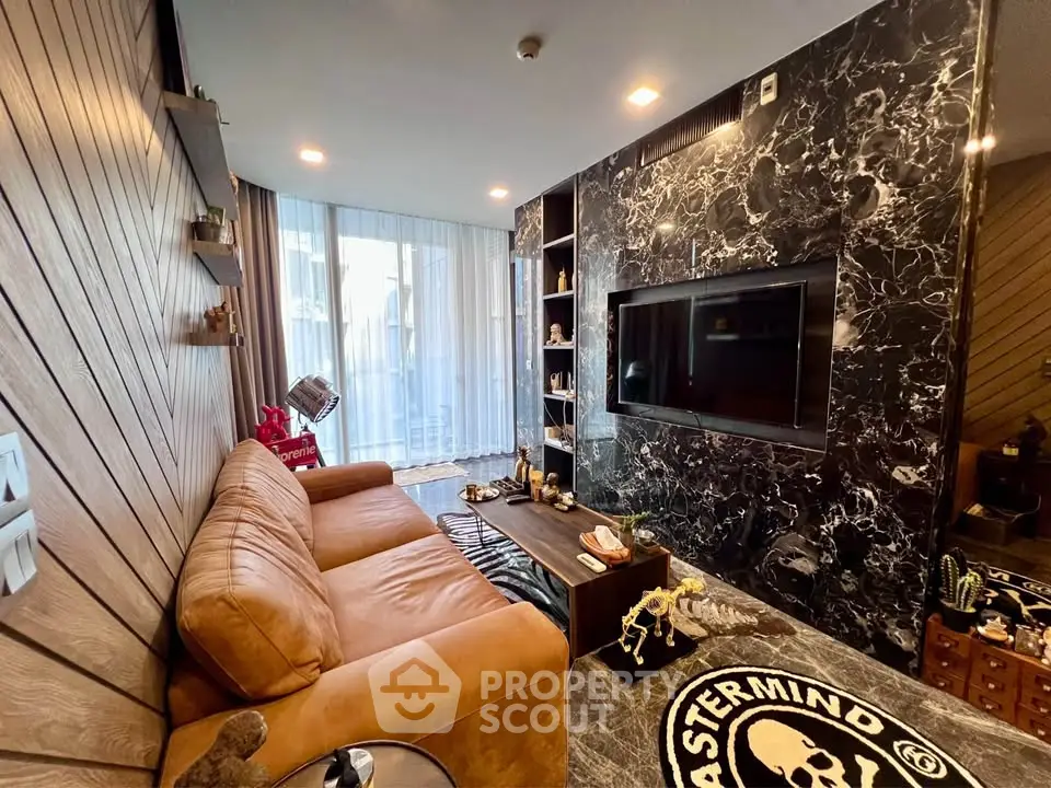 Luxurious living room with leather sofa and marble accent wall