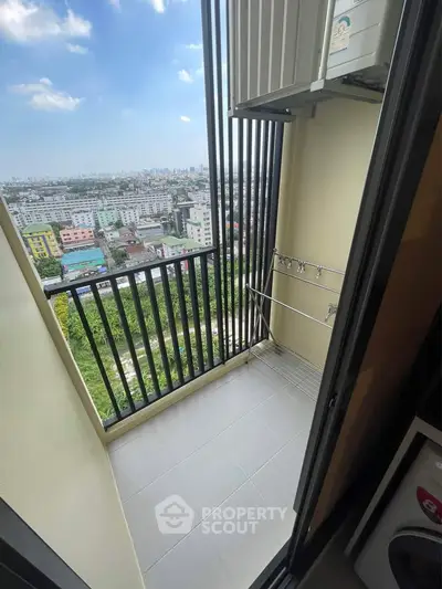 Charming balcony with city view, perfect for relaxation and enjoying the skyline.