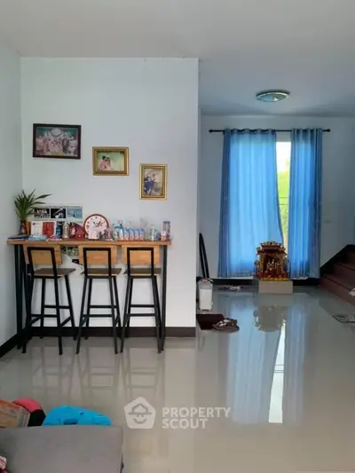 Modern interior with breakfast bar and bright natural light