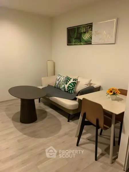 Modern living room with stylish furniture and decor, perfect for cozy gatherings.