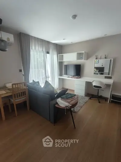 Modern living room with stylish furniture and natural light