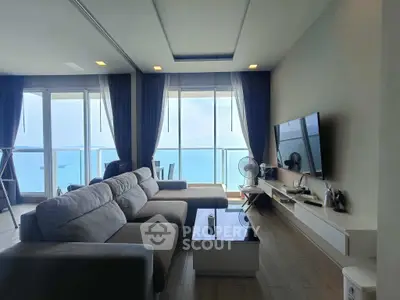 Luxurious living room with stunning ocean view and modern decor