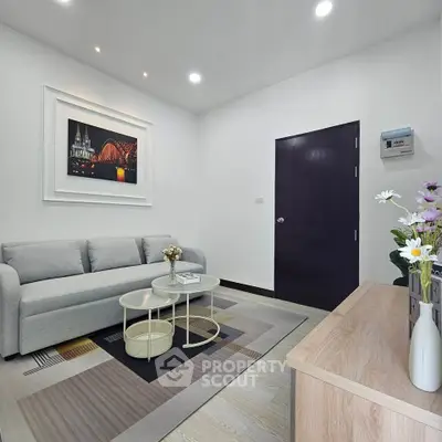 Modern living room with stylish decor and cozy sofa