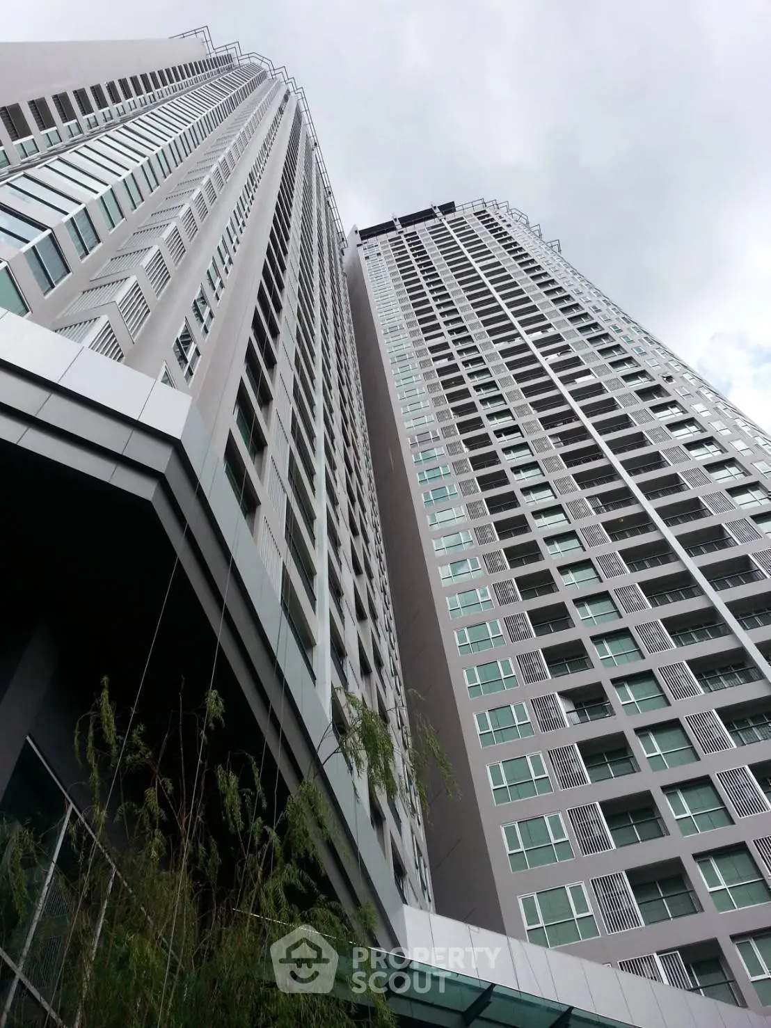 Stunning high-rise building with modern architectural design and expansive windows.
