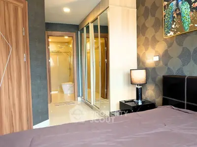 Modern bedroom with ensuite bathroom and stylish decor