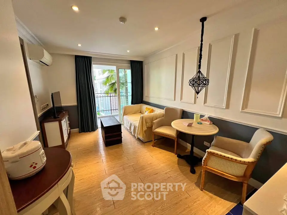 Charming living room with elegant decor and cozy seating area, perfect for relaxation.