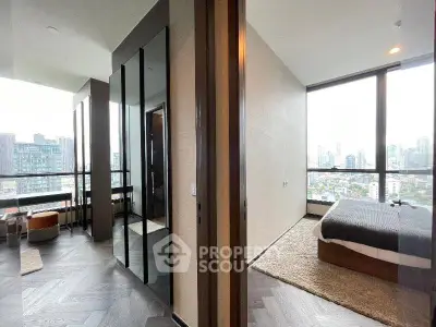 Luxurious corner unit with stunning city views and elegant bedroom design.